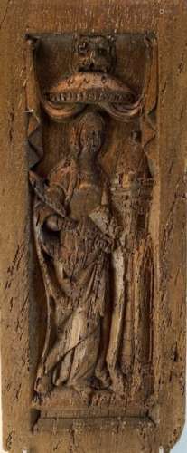 Panneau en bois sculpté en bas relief représentant Sainte Ba...
