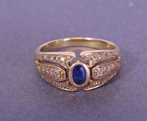 Bijou: Bague en or jaune 18K sertie de diamants et d'un saph...