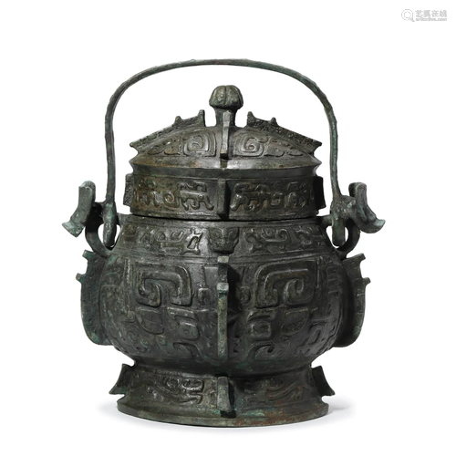 A Bronze Ritual Loop-Handle Vessel You