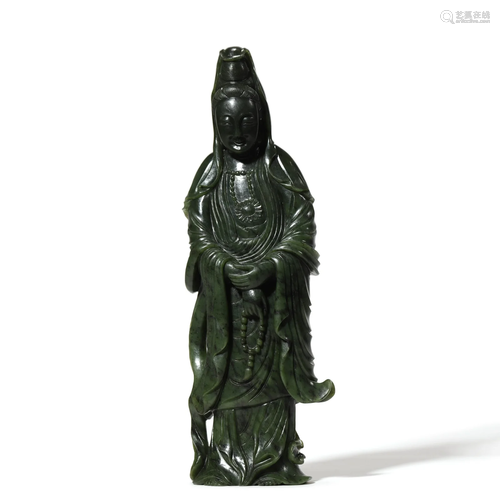 A Carved Spinach-Green Jade Standing Figure