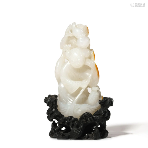 A Carved White Jade Figure Ornament with Wood Stand