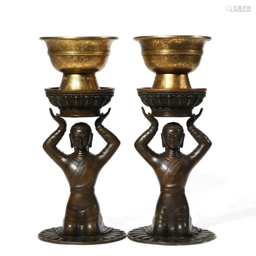 A Pair of Gilt Copper Figural Oil Lamps