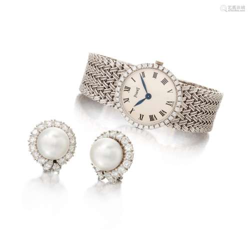 Cultured pearl and diamond earclips and a lady's diamond wri...
