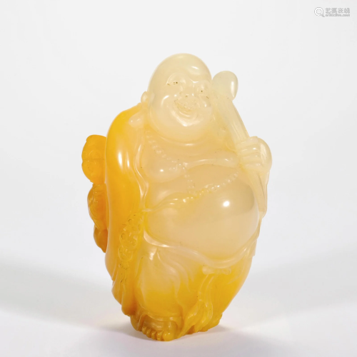 A Carved White and Russet Jade Budai Qing Dynasty