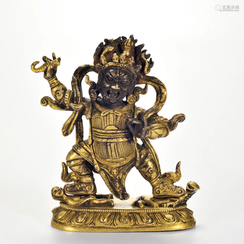 A Tibetan Bronze-gilt Protector