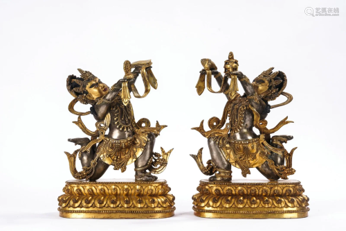 Pair of Gilt Silver Dragon Buddhas