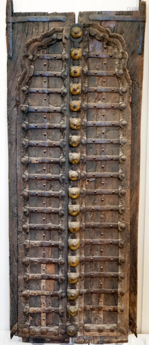 A pair of antique wooden doors, part of a Japanese