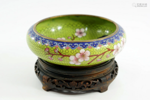 A bowl of Chinese cloister on a matching stand