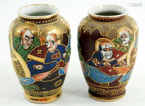 A pair of Japanese sochuma vases decorated with gilding