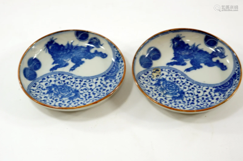 A pair of handmade Japanese saucers dragon and flowers