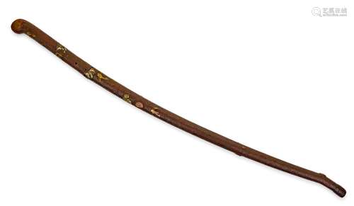 A KATANA MOUNTED AS A CANE