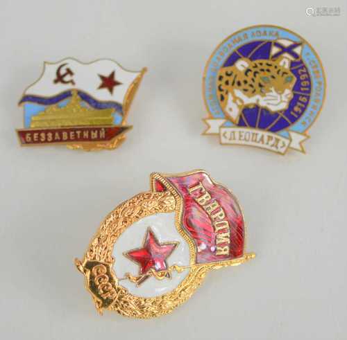 Three vintage Soviet badges to include 1918-1992 