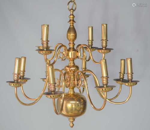 A Belgian brass chandelier, with twelve branches in two tier...