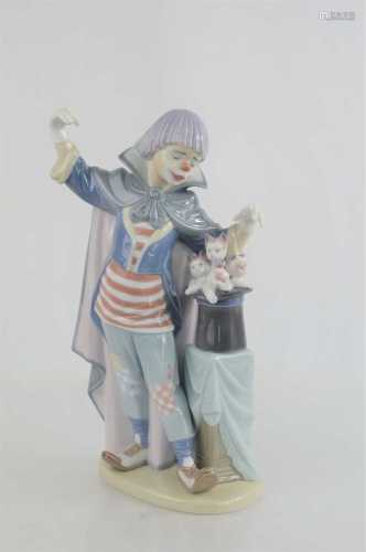 A Lladro clown, standing beside a magic hat with kittens, 58...