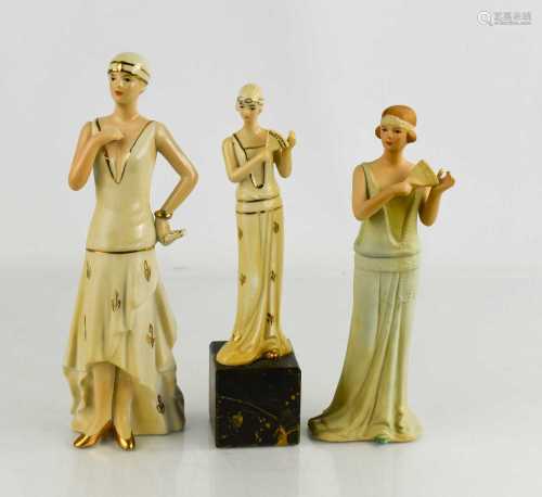Three Art Deco porcelain figurines, one raised on a plinth 2...