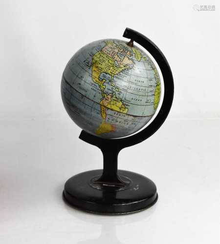 A miniature vintage metal table globe, 20cm high.