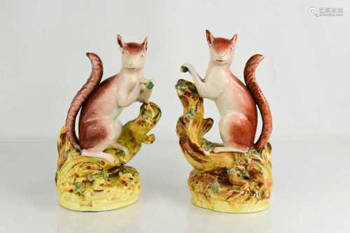 A pair of late 19th century Staffordshire squirrels, 22cm hi...