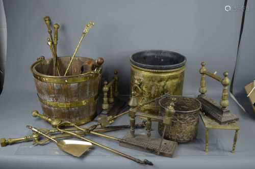 A group of brassware to include fire irons, coal buckets, ke...