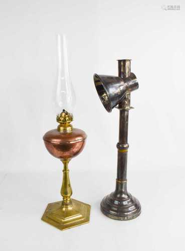 An antique brass and copper table lemp, toether with a steel...