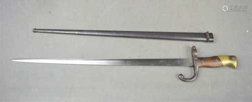 A French 19th Century Model 1874 Bayonet with scabbard, insc...