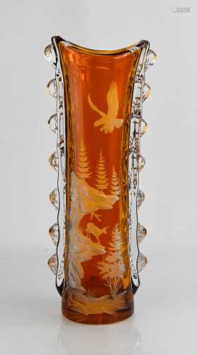 A tall amber and transluscent cut glass vase, the encased am...