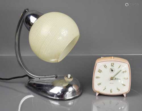 A Retro chrome table lamp with glass shade, together with a ...