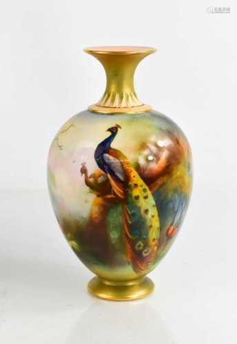 A Royal Worcester vase, decorated with a peacocks amidst tre...