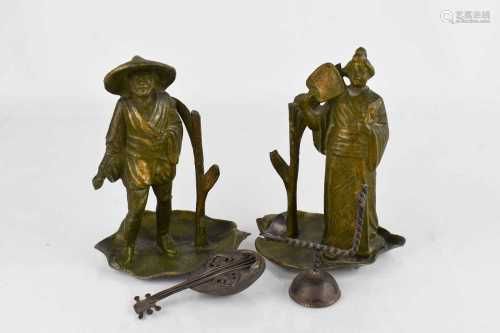 A pair of Japanese metalware figures, together with a white ...