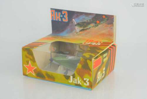 A vintage diecast model of a YAK-3 WWII plane, made in Russi...