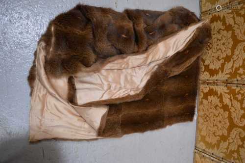 A large vintage fur throw, with silk type backing 248 by 138...