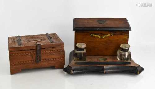A Victorian inkstand, treen box and a travelling chess set.