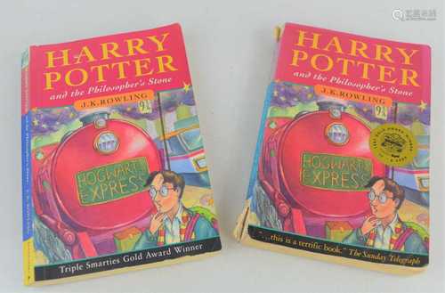 Two Harry Potter and the Philosopher's Stone books, one is 1...