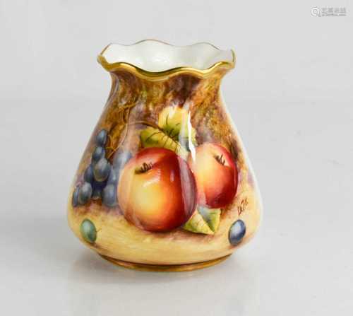 A Royal Worcester vase decorated to the front with fruit to ...