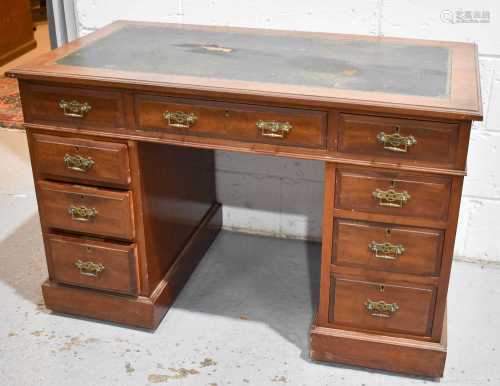 A Victorian mahogany pedestal desk with leather skiver and t...