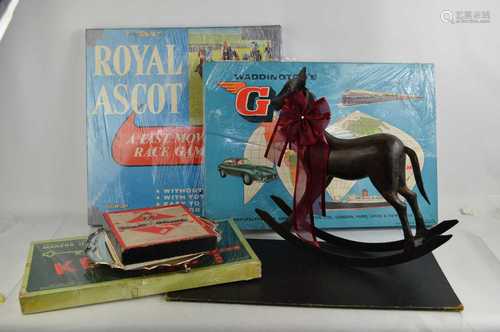 A group of vintage board games to include Monopoly, Go, Roya...