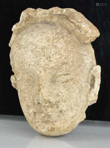 A rare Gandhara carved stone head, circa 2000BC 16cm high.