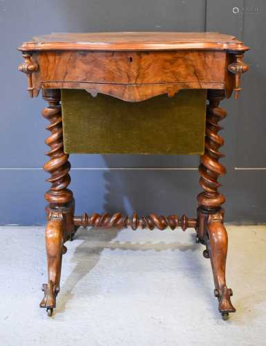 A Victorian figured walnut work box and sewing table with re...
