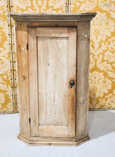 A antique pine corner cupboard with two interior shelves109c...