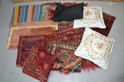 A quantity of small rugs including two striped kelims with c...