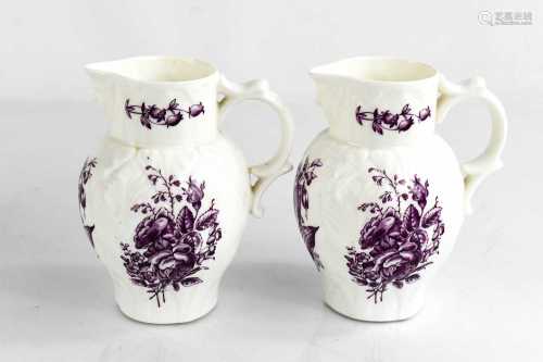 A Royal Worcester pair of small jugs, modelled with face mas...