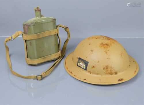 A WWII era British desert Brodie helmet and liner dated 1938...