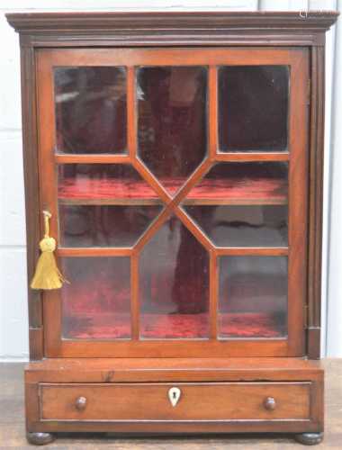 A Victorian mahogany glazed table top display cabinet, the g...