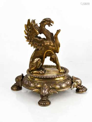 A silver plated griffin centrepiece, the finely modelled gri...