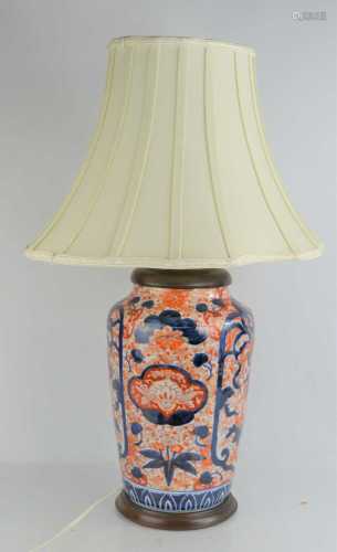 A large Imari vase converted to a table lamp with shaped cre...