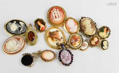 A group of vintage cameo and portrait brooches on shell and ...