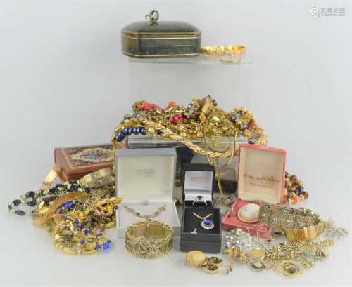 A large quantity of vintage jewelery to include necklaces, b...