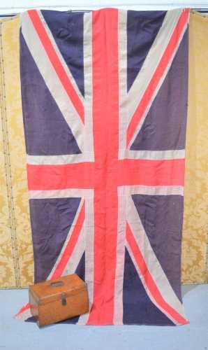A very large vintage linen Union flag, complete with rope an...