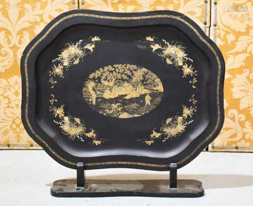 A Victorian black lacquered chinoiserie decorated tray on st...