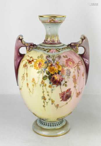 A Royal Worcester vase, painted with flowers to a cream and ...