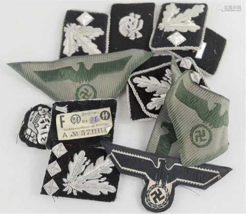 A group of German military collar tabs and cloth badges